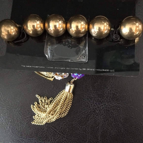 New bebe Gold, purple balls & tassel bracelet - Picture 2 of 2